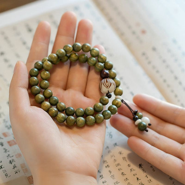 Zen&Spirit Multi-Wrap Green Sandalwood Bracelet: Carved Beads, Spiritual Design